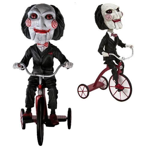 Saw Puppet on Tricycle Head Knocker
